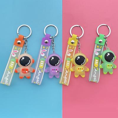 China Cute PVC Cartoon Rocket Astronaut Space Souvenir Promotion Gift Soft Key Chain Rubber Wristband Strap Cute Key Ring Gifts for Kids Girls Men for sale