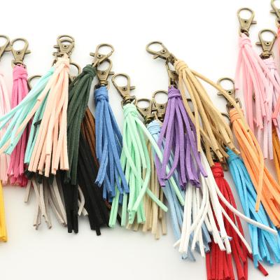 China Korean Cashmere Tassel Key Chain Bracelet Long Style Retro Tassel Key Chain Retro Leather Hand - Woven Tassel Wooden Brand Key Chain for sale