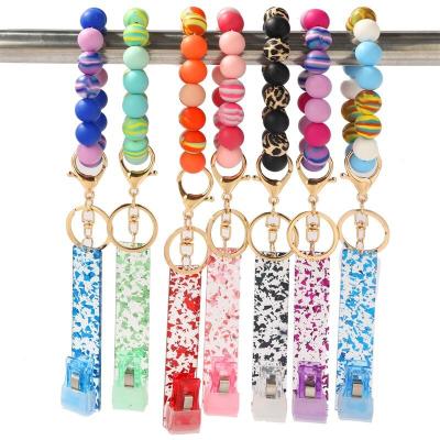 China Eco-friendly Credit Card Puller For Long Nails Silicone Beads Key Chain Wristband ATM Card Puller Card Grabber For Long Nails Key Chain for sale