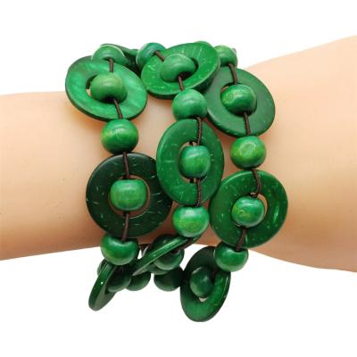 China Statement Punk Bohemian Jewelry Green 3 Layer Handmade Wooden Bracelets For Women One Way Beaded Bib Bracelet Wholesale for sale