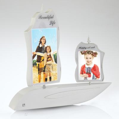 China Rotating Yacht Shape 360 ​​Degree Rotating Photo Frame For Kids Gifts for sale