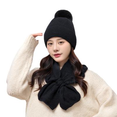 China 2021 COMMON Wholesale Women Knitted Winter Beanie Hat And Scarf Set Fashion Design 2pcs With Faux Fur Pom Pom For Ladies for sale