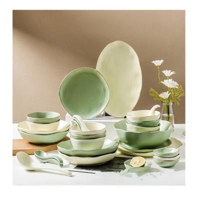 China Hot Selling Viable Ceramic Rim Ceramic Set New Product Matt Tableware Set Irregular Curved Golden Dish Set for sale