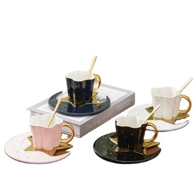 China 2022 New Design Viable Flower Shaped Coffee Cup With Real Gold Handle Unique Design Moon Saucer Coffee Set for sale