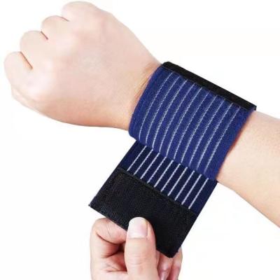 China Durable Suitable For Multiple Scenarios Powerlifting Custom Wrist Wraps Adjustable Fitness Wrist Wrap for sale