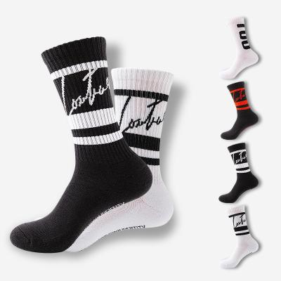 China 2021 Wholesale designer jacquard woven crew cotton QUICK DRY premium men fashion unisex socks for sale