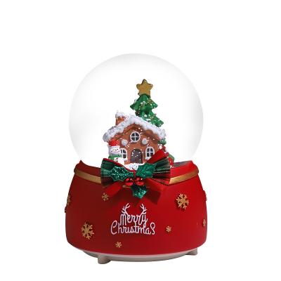 China 2023 Folk Art Christmas Crystal Ball Resin Ornaments With Lights And Music Auto Snow Xmas Drift Souvenirs For Kids Gifts for sale