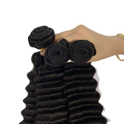 China Big 30 Inch Deep Wave Brazilian Human Hair Weave Lace Up Transparent Deep Loose Wave Bundles With Closure for sale