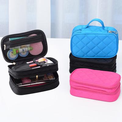 China KOREAN fashion, portable makeup bag large capacity, double nylon cosmetics storage bag waterproof handheld travel makeup bag for sale