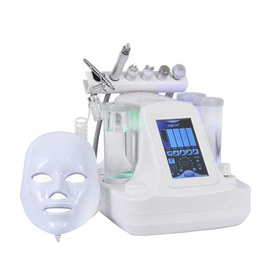 China Skin Tightening Multifuncional Skin Scrubber Skin Care Water Facial Ultrasonic Massage Remove Equipment Microdermabrasion Peeling Machine for sale