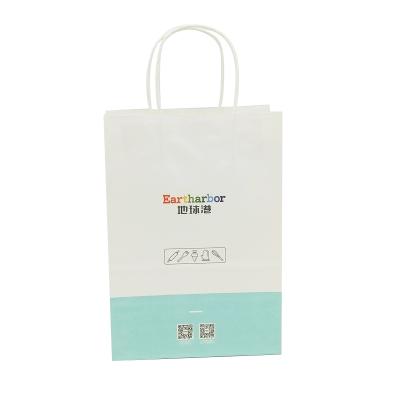 China Recycled materials art style paper bag custom shopping paper bag with logo paper shopping bag with handle for sale