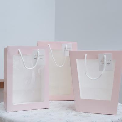 China Wholesale Custom Creative Waterproof Craft Recyclable Art Paper Bags Flower Bouquet Handbag With Clear PVC Window for sale