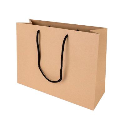 China Recycled Materials Retail Paper Gift Shopping Bag With Brown Bow Kraft Paper Bag Gift Nude With Black Handle for sale