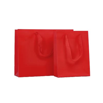 China Recycled Materials Wholesale Paper Carrier Bag With Handle Kraft Paper Satin Handle Paper Bag With Ribbon Handles for sale