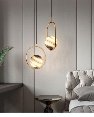 China Modern Nordic Simple Ceiling Hanging Adjustable Pendant Light Glass Chandeliers Pendant Lamps Gold Globe Pendant Light for sale