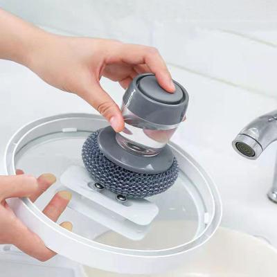 China Kitchen Viable Dishwashing Pot Brush Steel Ball Soap Brush Dish Wash Rubbing Dispensing Brush With Soap Dispenser for sale