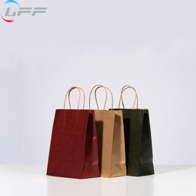 China Recyclable Manufacturer Customized Kraft Paper Bag With Handle for sale