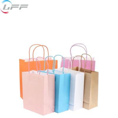 China Recyclable Custom Logos Print Gift Shopping Paper Bag With Brand Name for sale