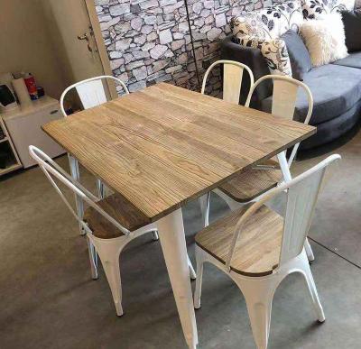 China Practical Cheap Luxury Vintage Restaurant Dining Table Iron Furniture Metal Legs Wooden Top Designs for sale