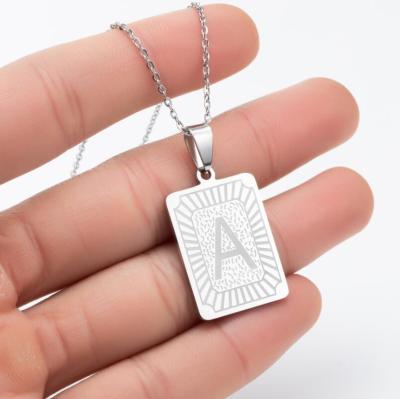 China FASHIONABLE Women Letter A-Z Initial Necklace For Women 18K Gold Stainless Steel Rectangle White Shell Alphabet Pendant Necklace for sale