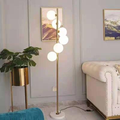 China Modern Hot Popular Bedroom Bedside Study Glass Ball Floor Lamp Living Room Nordic Creative Marble Floor Lamp for sale