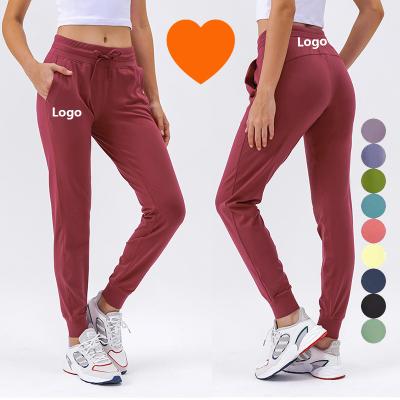 China D19069 Breathable Lulu Lemon Women Jogger Lace Up Cycling Workout Gym Workout Fitness Gaiters Jogging Pants Breathable Yoga Runner With Pockets for sale