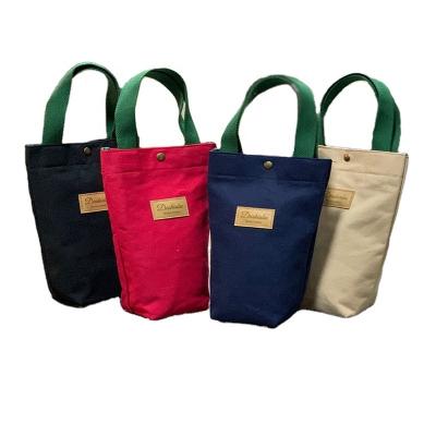 China 210D Polyester Tote Bag Camping Cotton Canvas Water Cup Handbag Water Bottle Bag Thermos Portable Hand Holder Carrier Liner for sale