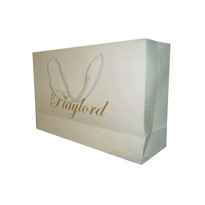 China Recyclable Custom Logo Printing Gift Paper Packaging Bag for sale