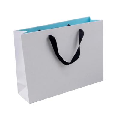 China Recyclable Custom Logo White Paper Kraft Paper Gift Porcelain Shopping Bag for sale