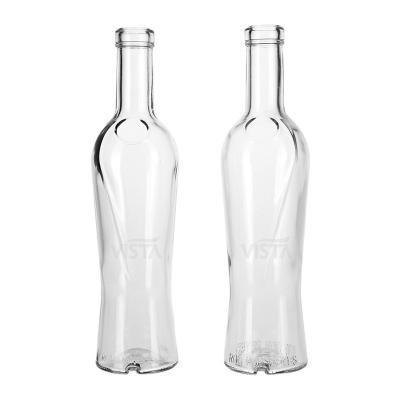 China 750ml Custom Empty Liquid Embossing Full Size Flint Glass Bottle Clear Glass Bottle For Wine With Cork Top for sale