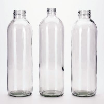 China Beverage VUE Round 750ml Glass Empty Bottle Milk / Juice / Tea / Soda / Beverage Glass Bottle With Lid for sale