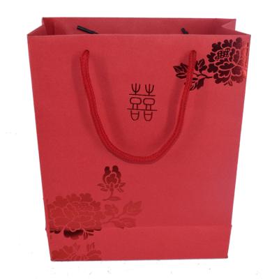 China Recycled materials custom gift bag, exquisite multi-color printing, embossed design, tan for sale