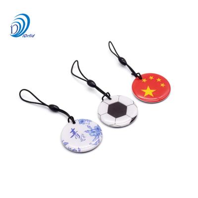 China Waterproof Round 35mm Smart Card FOB 13.56MHz Epoxy Resin NFC Card Key for sale