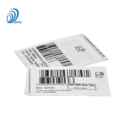 China Programmable RFID Garment Label UHF Clothing Tag Fabric Clothing Tag for sale