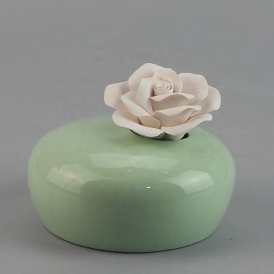 China ceramic & Elegant Enamel Flower Ceramic Essential Oil Car Diffuser for sale