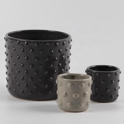 China Contemporary New Arrive Stylish Black Ceramic Flower Pots Wholesale for sale