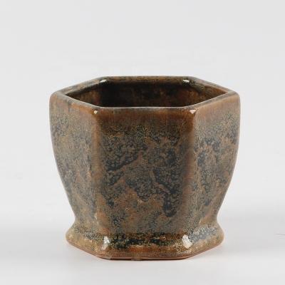 China Contemporary Unique Style Faceted Exotic Porcelain Flower Pots Wholesale for sale