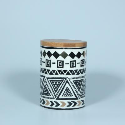 China Contemporary New Design Round Shape Creative Decal Ceramic Storage Canister for sale