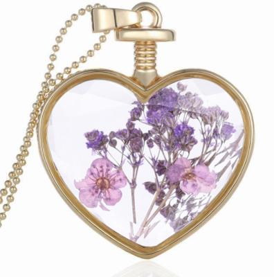 China High Quality Wholesale Amazon French Gold Color Hot Selling Glass Heart Inside Flowers Dry Pendant Necklace For Women BabyGirls for sale