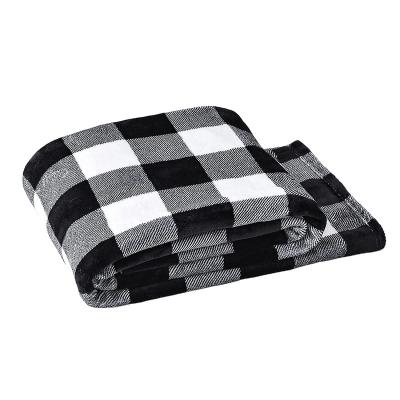 China Anti Pill Knitted Polyester Flannel Fleece Fabric Rolls Black And White Buffalo Plush Lightwight Extra Soft Warm Fabric For Blanket for sale