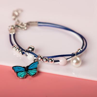 China Cute Cute Alloy Plus Porcelain Beads Butterfly Pendant Bracelet Charms Handmade Bracelets For Women Wholesale for sale