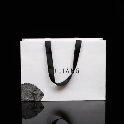 China Supplier Custom Fancy White Color Paper Aseptic Design Handbags, Shopping Bag With Brand Logo Print for sale