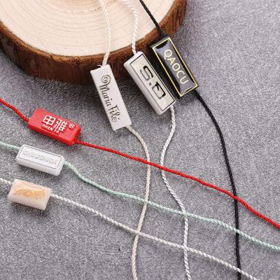 China Viable Supply Hang Tag String,Clothing String Seal Factory Plastic Hanging Tag For Garment for sale