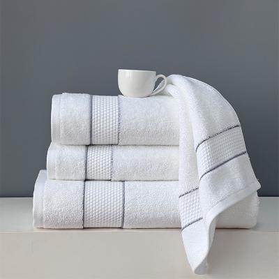 China Viable Hot Sale Amazon Quality Hotel Towel White Balfour Hotel Towels White Hilton Hotel Custom Logo for sale