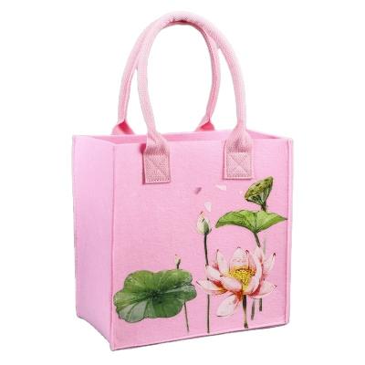 China Felt Hot Selling Volumetric Felt Bag With Animal Pattern Wine Felt Cosmetic Shopping Bag for sale