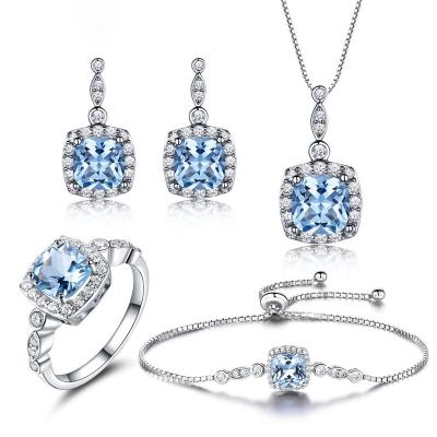 China Custom Made Romantic 925 Sterling Silver Set Sky Blue Topaz Necklace Earrings Ring Bracelet four piece set for sale