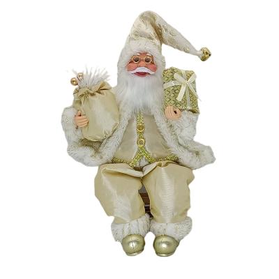 China 14 Inch Festival Christmas Doll Decoration Traditional Gold Cloth Sitting Santa Claus Statuette for sale