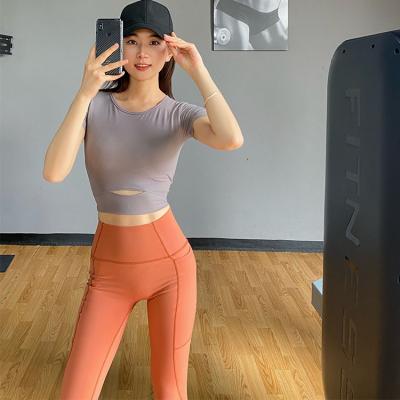 China Elastic Yoga Clothes Exposed Short Belly Button Sleeves With Chest Pads, Sports Running Tops, Slim Diet T Shirts for sale