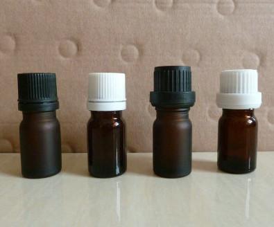 China 5ml brown amber frosting essential oil glass bottles, dark glass vial with plastic cap for sale