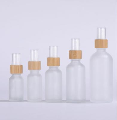 China Bamboo Spray Bottle of 5ml 10ml 15ml 20ml 30ml 50ml 100ml Grosted Glass Essential oil bottle bamboo package for sale